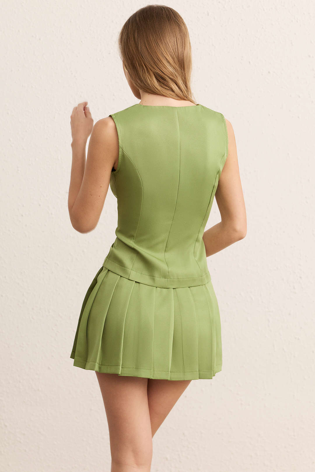 Metallic Button Round Neck Vest And And Pleated Skirt Set