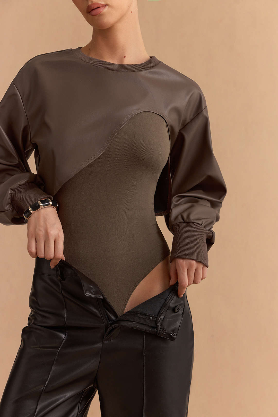 Faux Leather Patchwork Round Neck Asymmetrical Long Sleeve Bodysuit
